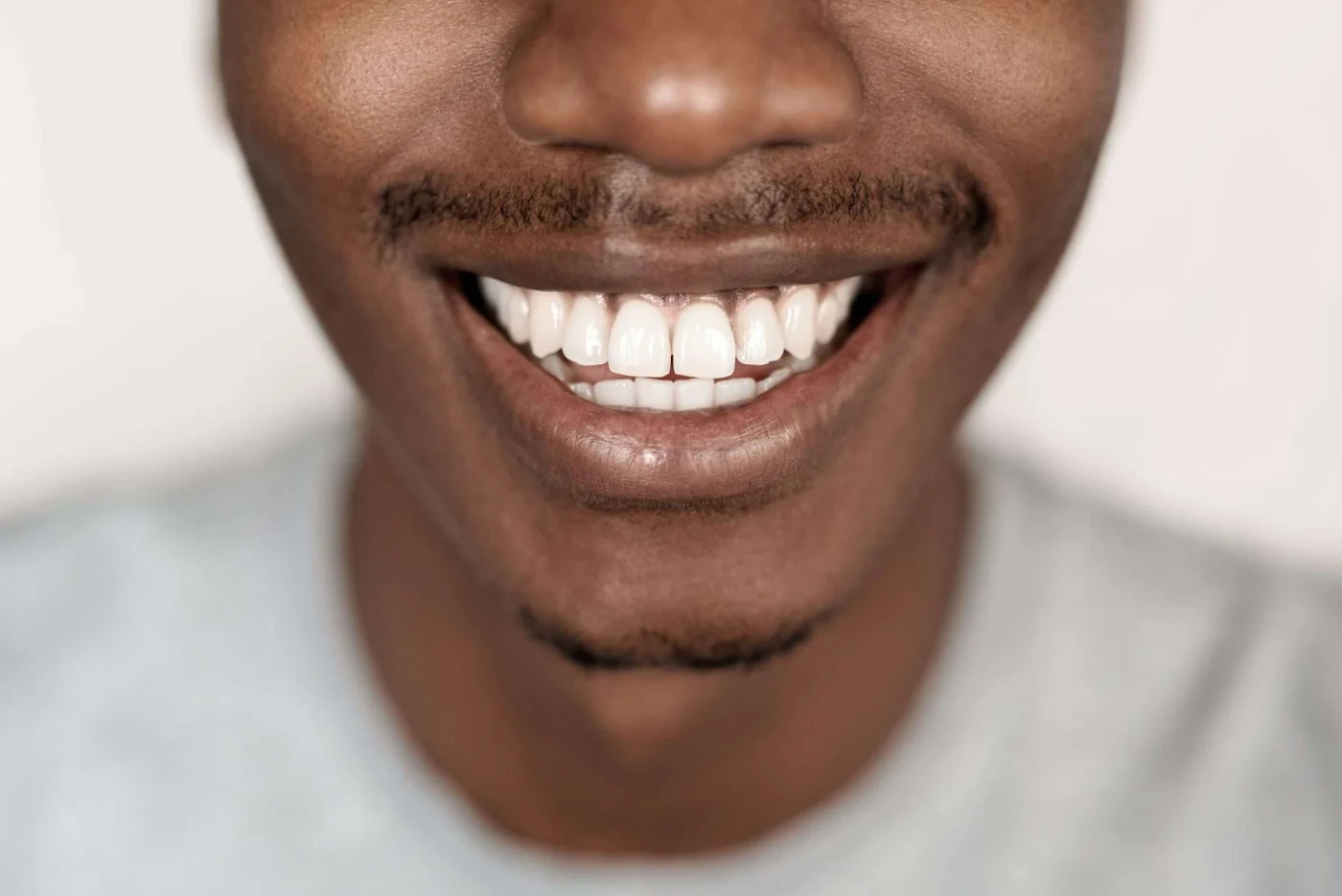 Close up of African American man smiling at camera
