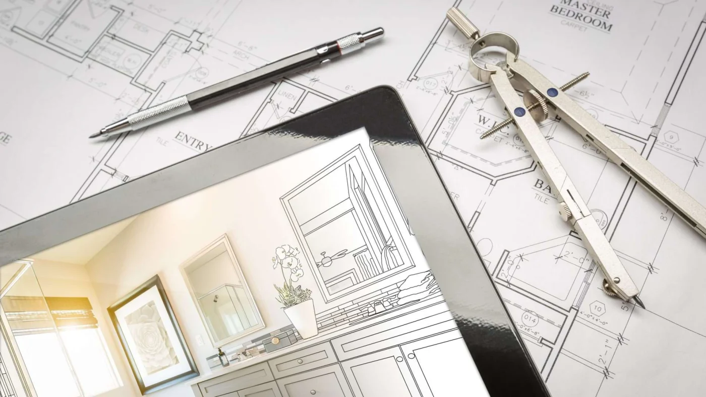 A tablet with design sketches overlaying the design plans for a primary bath