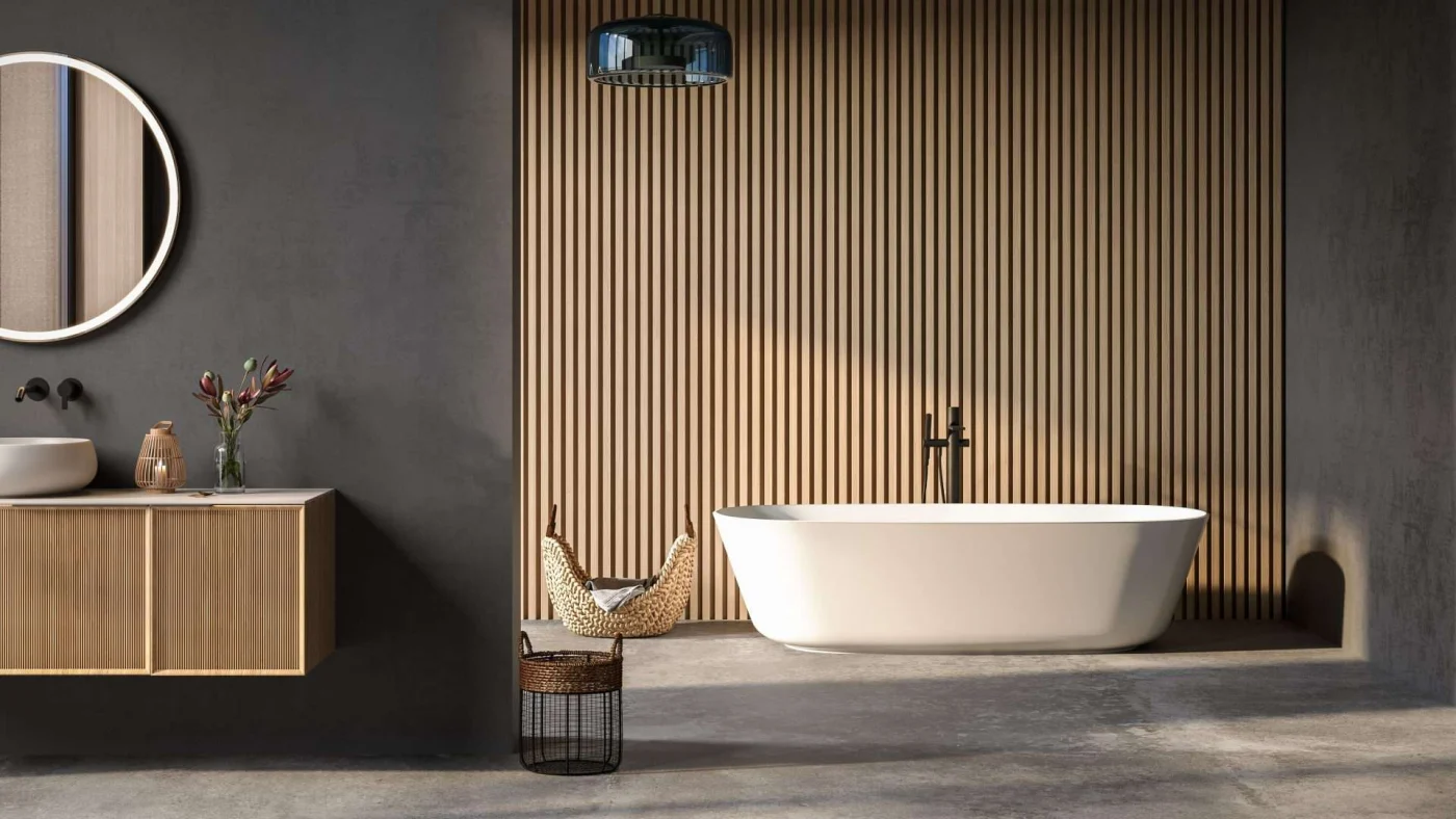 Frontal view of a sleek, spa-like bathroom with concrete floors, a freestanding bathtub, a vanity with a bowl sink, and a slatted wood accent wall
