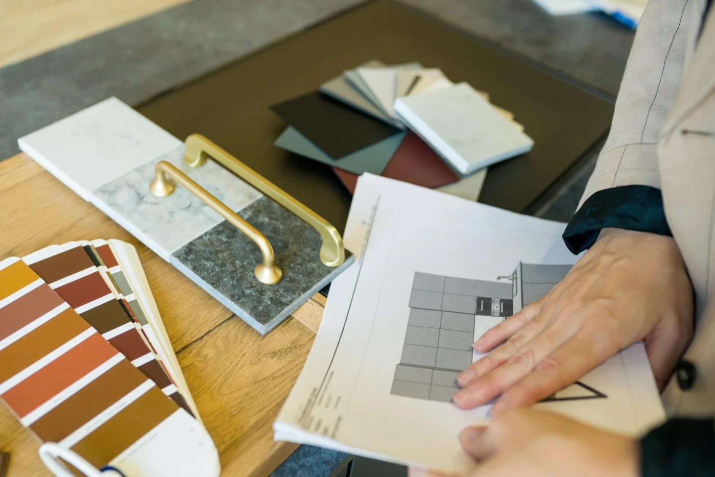 Jericho Home Improvements designer reviewing kitchen remodeling design for Olathe, KS home.