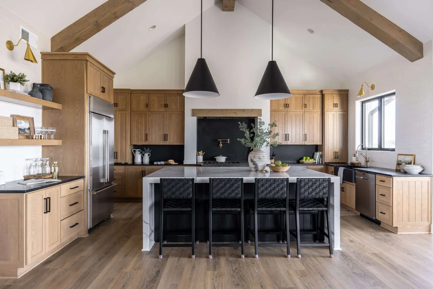 Stylish rustic kitchen with island and natural wood cabinets in Shawnee, KS