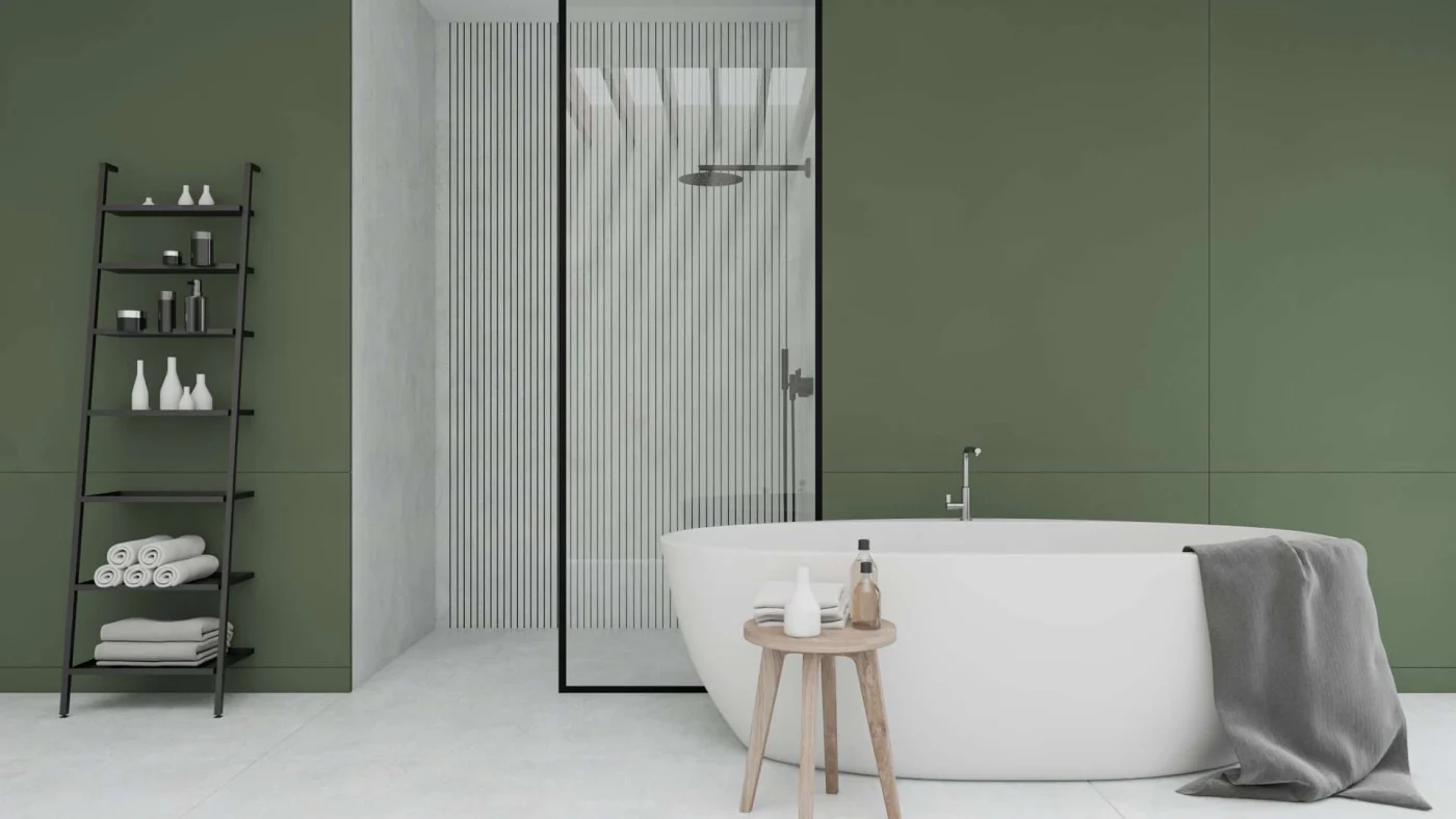 A bathroom with a black ladder shelf, stand-alone tub, and walk-in shower