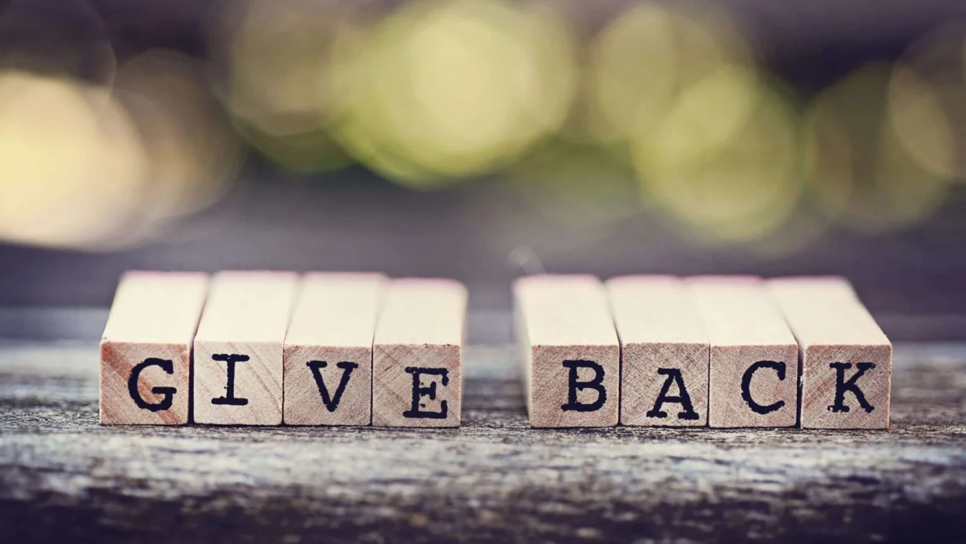 Blocks that spell 'GIVE BACK'