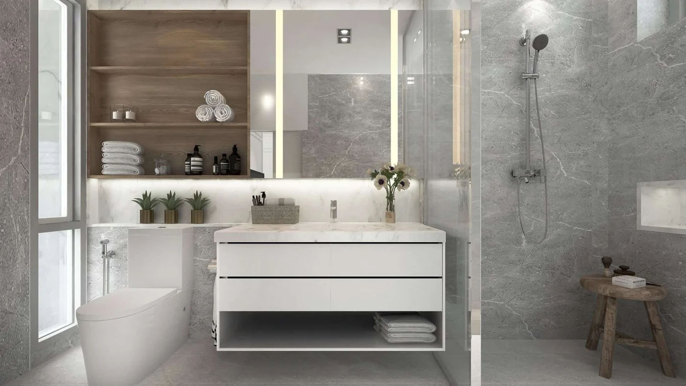 Frontal view of a modern bathroom with a toilet, vanity, and adjoining shower stall