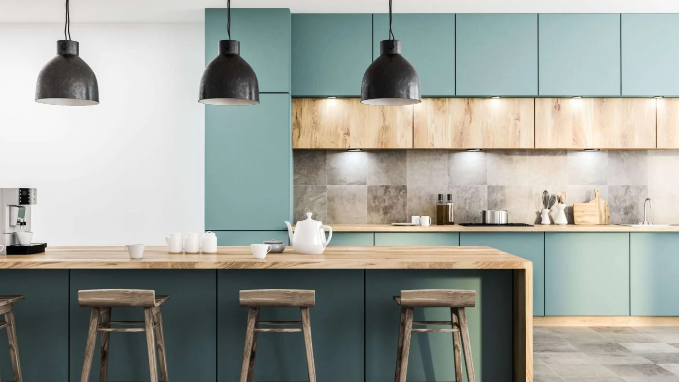 Kitchen remodel with blue cabinets and wood countertops