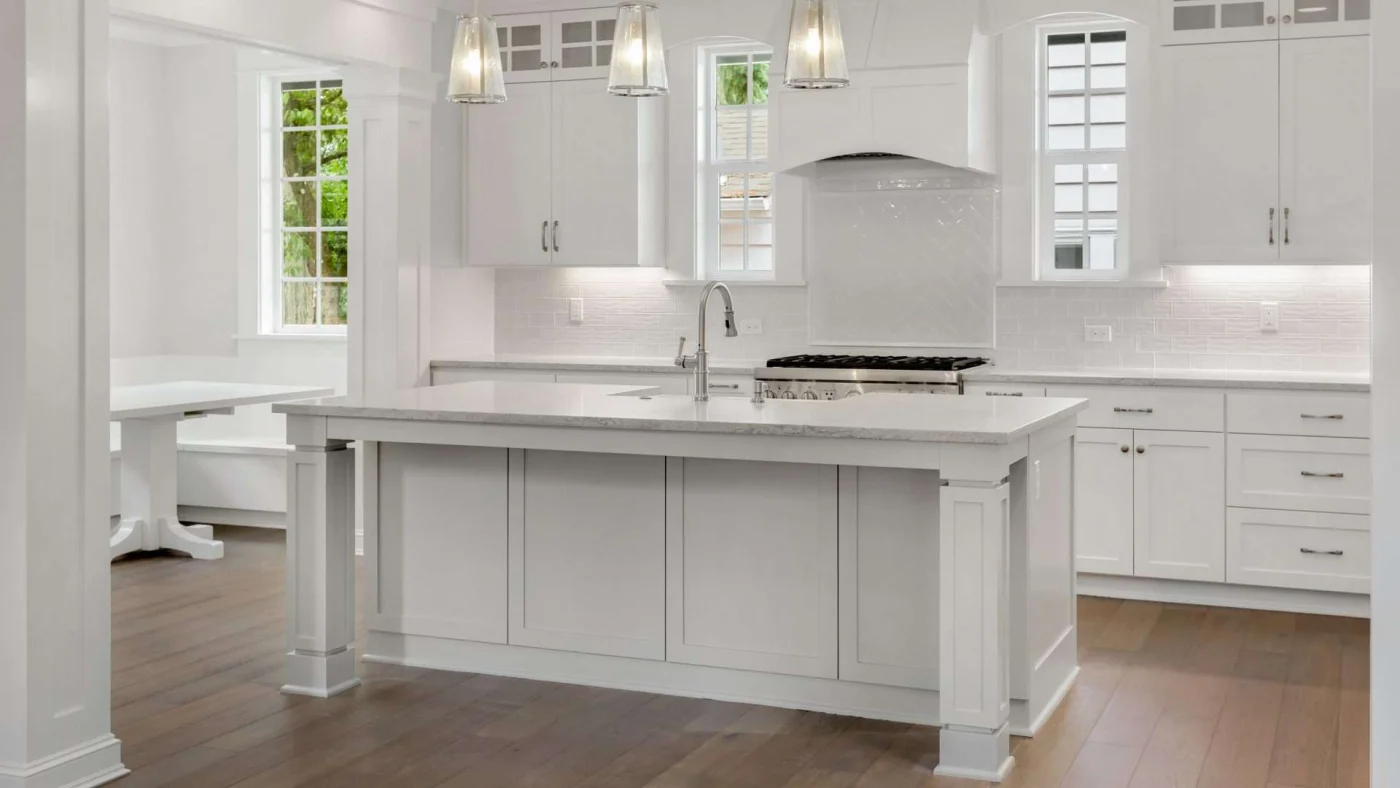 Beautiful new kitchen remodel with white cabinets and countertops