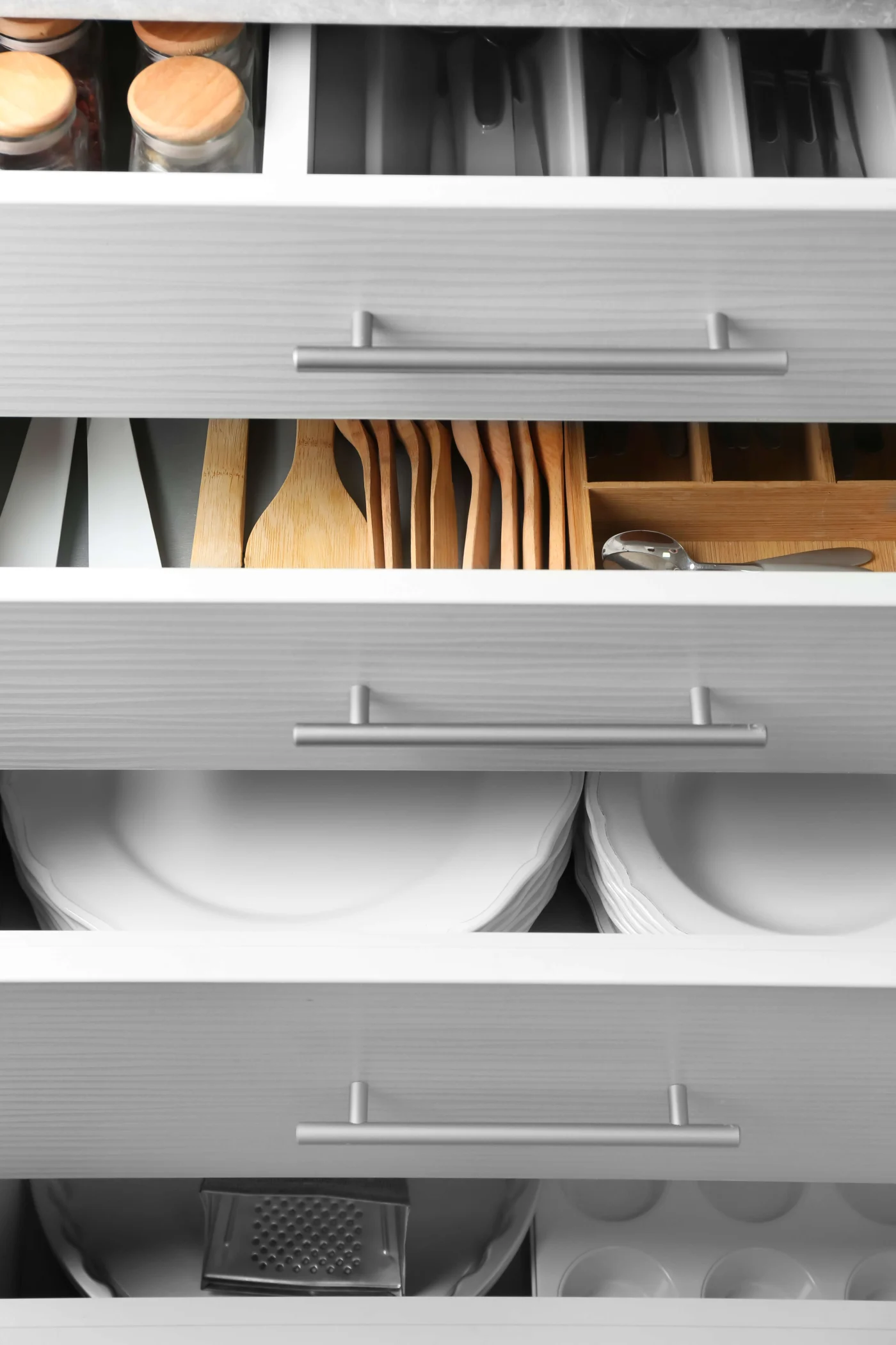 Close-up view of new drawers organized to eliminate clutter on counters
