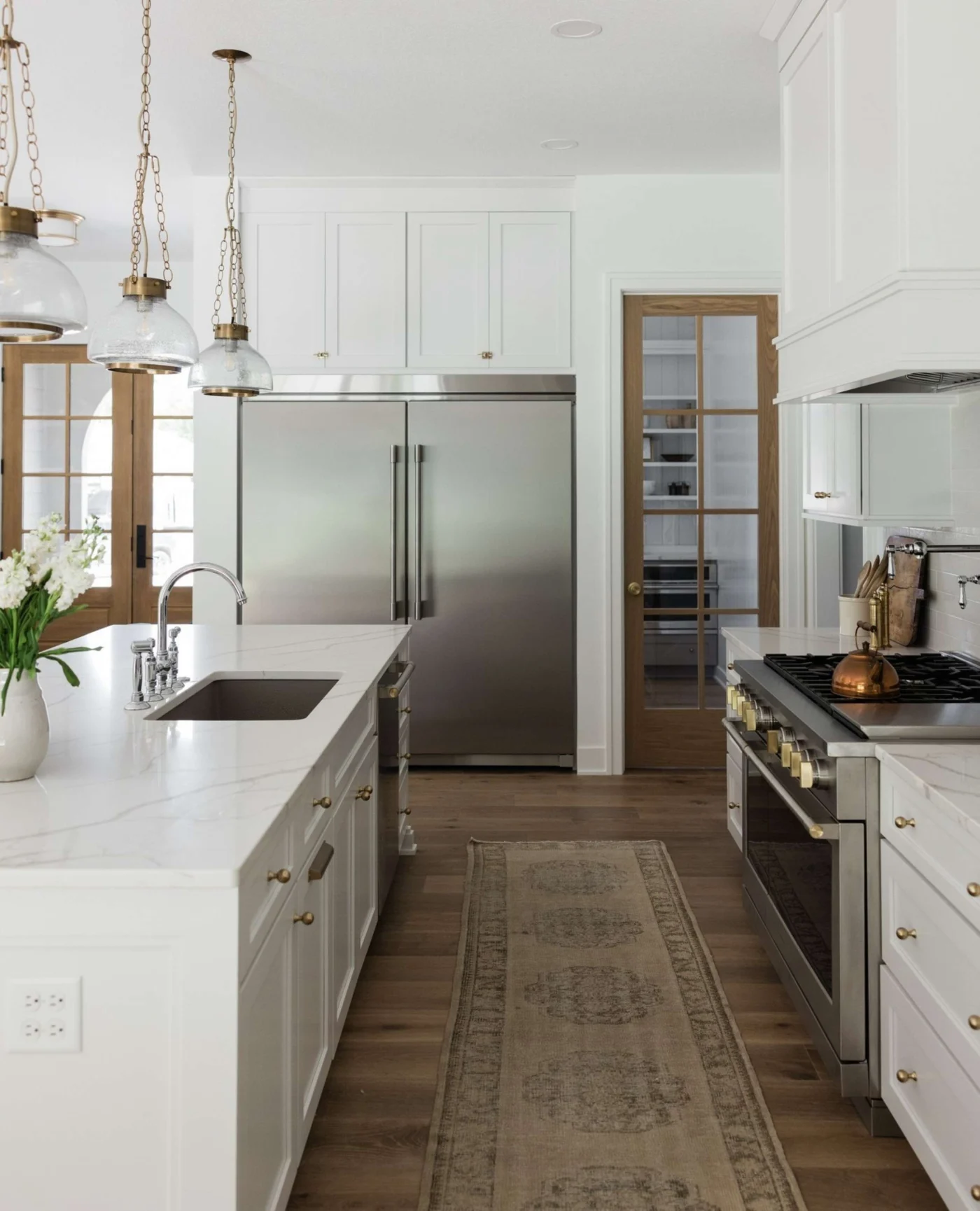 Beautiful kitchen with white cabinets and granite countertops